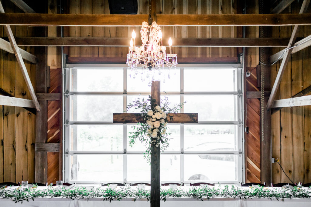 ceremony cross at an august wedding at farmer and frenchman, flowers by emerald design