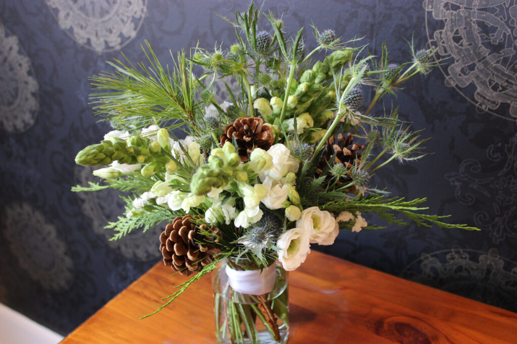 Bridal bouquet created for a winter wedding by evansville florist emerald design